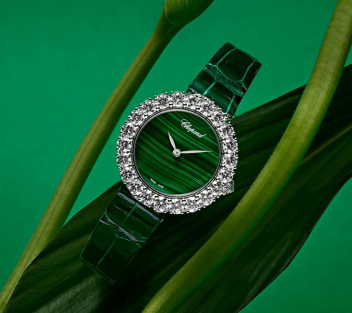 Diamond luxury watch with a malachite dial