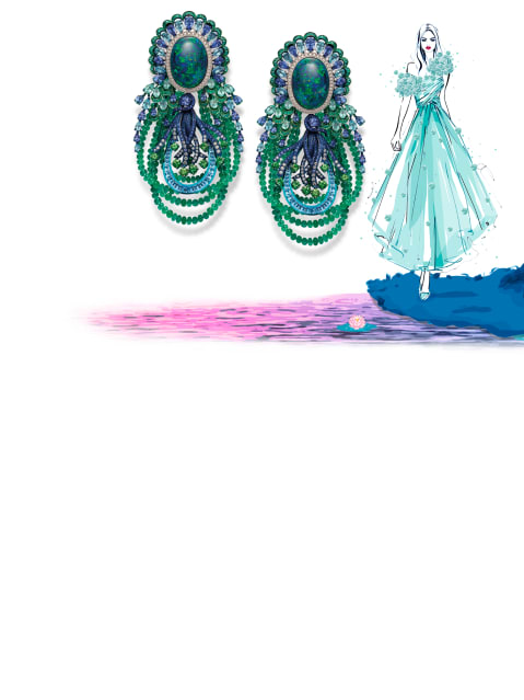 Uno splendido paio di orecchini impreziosito da opali e perle di smeraldi. 